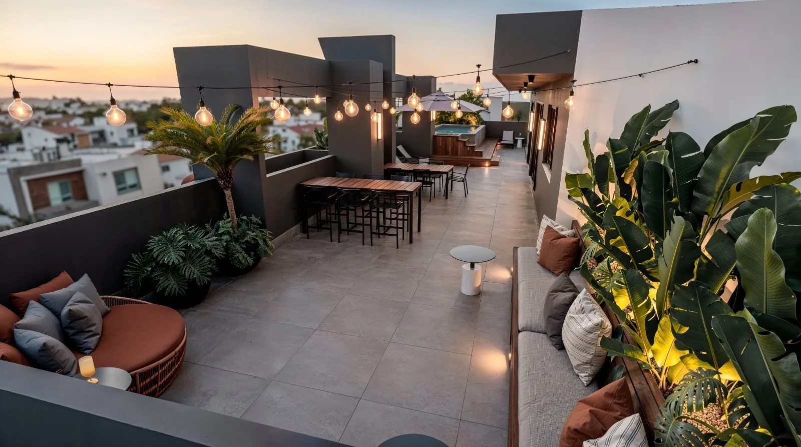 Terraço lounge com paisagismo e varais de luz